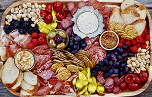 Accent Limousine offers charcouterie board service - choose your group's favorites appetizers and we will have them prepared for your event.